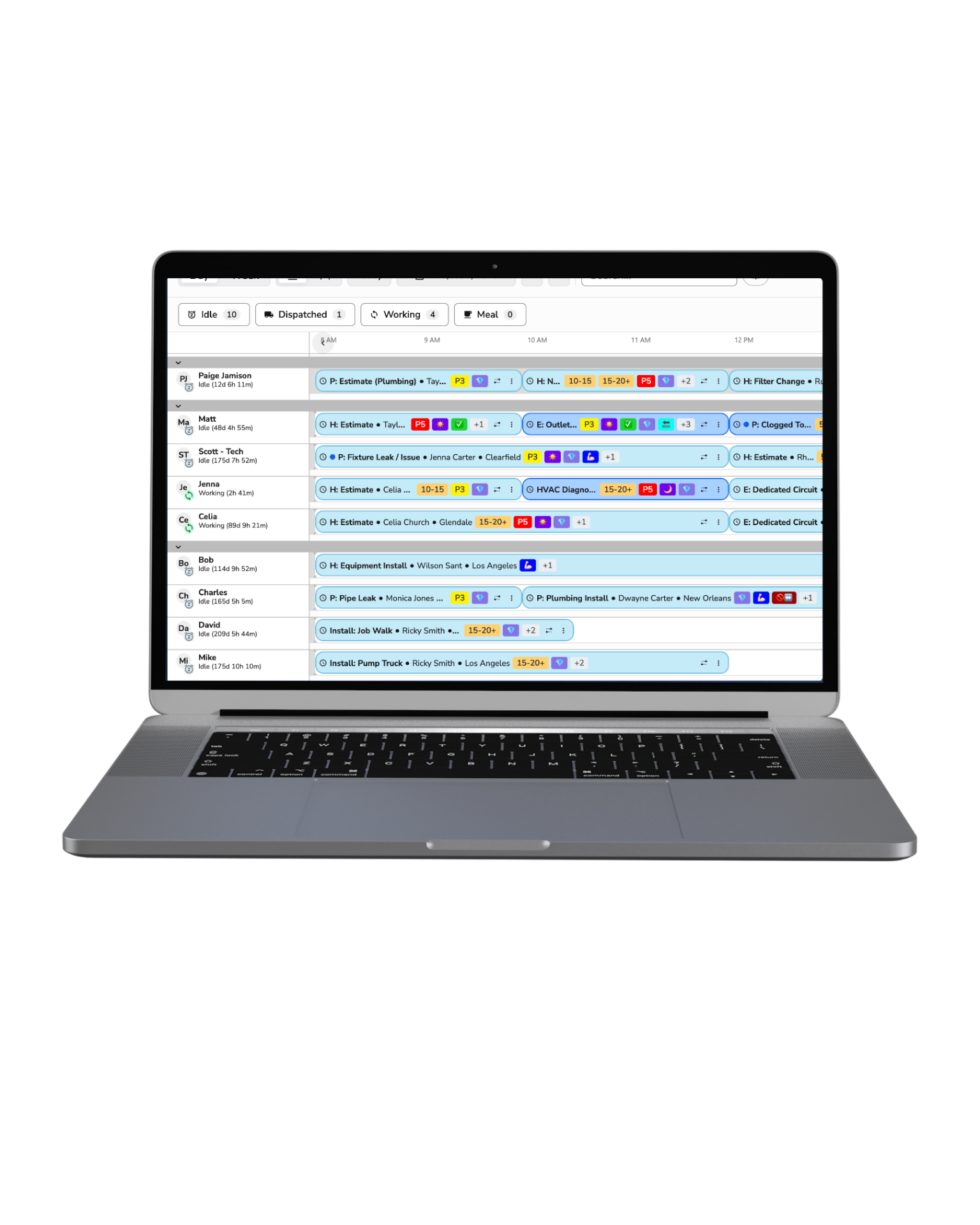 ServiceTitan dispatch board shown on a MacBook